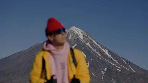 40 Blurry portrait of young man wearing sunglasses and knitted hat against backd Stockbeeldmateriaal 334165582