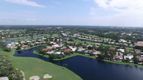 40 St Thomas dolly in crane down backyard view golf course. Stock Footage 55288118