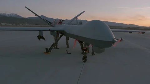 432nd Wing maintainers perform preflight checks on MQ-1 and MQ-9 - 2015 Stock Footage 98953475