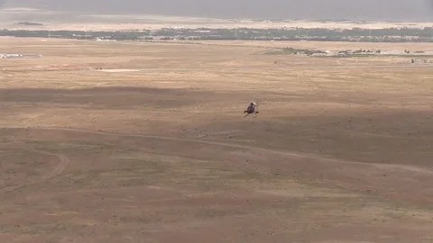 438th Air Wing fly Afghan air force MD-530 Cayuse Warrior helicopter - 2016 Video stock 89239765