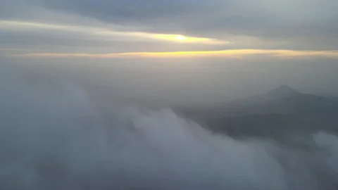 44.Let's find the sun deep in the sky. a beautiful sunrise in the clouds. Stock Footage 303515547