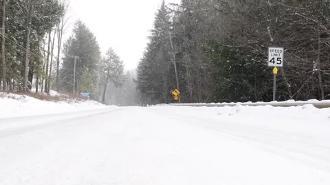45 mile speed limit snowed in road Stock Footage 262000808