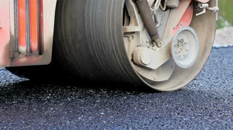 453 asphalt rollers working its magic on the street Stock Footage