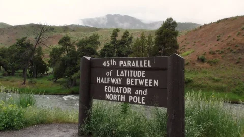 45th Parallel sign along Gardiner river, Yellowstone NP, USA Stock Footage 94672404