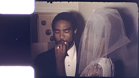 4/6/1973s L.A. Cal Groom Eats Cake Black Wedding Married Vintage Film Home Movie Stock Footage 199838031