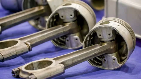 48674 Engine Components Including Pistons and Connecting Rods Displayed on .. Stock Footage 304169622