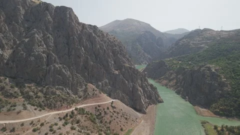 4K 10-bit drone shot starting at a stone tunnel entrance and flying forward to Stock Footage 342266781