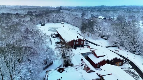 4K 10Bit Cinematic Drone Shot of Forest Residential Area in Snow Stock Footage 334837624