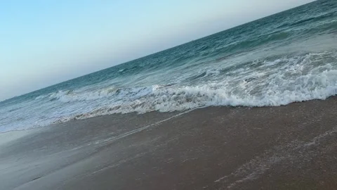 4K 120fps HFR Dutch Angle Shot of Ocean Waves Crashing on Beach Stock Footage 330932285