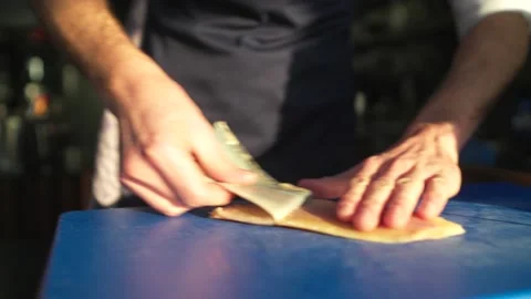 4K 25 fps chef pulling skin of a fish Stock Footage 171126208