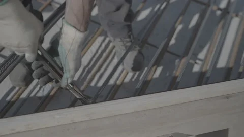 4K 25 fps slowmotion construction worker cutting wire Stock Footage 171209629