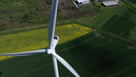 4K 25 fps static aerial drone shot from wind turbine Stock Footage 171130406