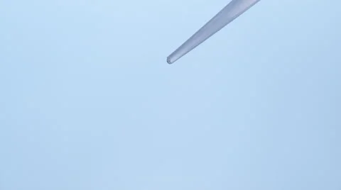 4K 30fps ,Falling drops from the pipette, Slow Motion Stock Footage 55532838