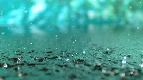 4K 30fps, Heavy rain in puddle, Slow Motion Stock Footage 55533981