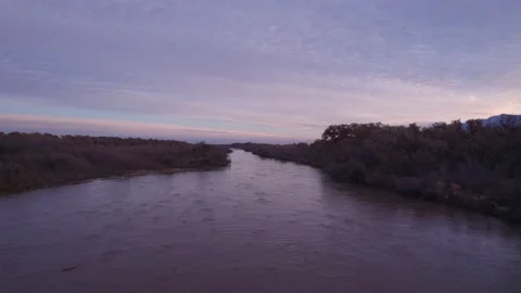 4k 30fps Slow drone flyover on the Rio Grande River on cloudy morning Stock Footage 221582676