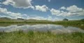4K 30p Pond at the top of the Continental Divide reflects the sky timelapse 4k or 4k+ Resolution