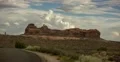 4K 30p wide Dramatic clouds build behind unusual rock formation 4k or 4k+ Resolution