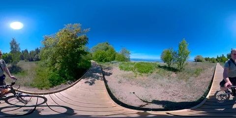 4K 360 VR 360VR of Biking on the trail in the forest on a sunny day In Estonia Stock Footage 91357212