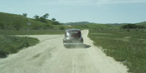 4K 40's Car Down Dirt Road Video stock 51267765