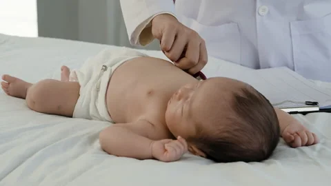 4K 50fps, Close-up of a doctor's hand using a stethoscope to listen Stock Footage 170921546