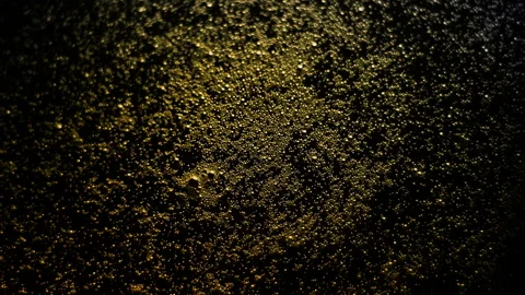 4K 59,94 fps Orange Beverage Bubbles Spinning Against Clockwise Direction Stock Footage 324703445