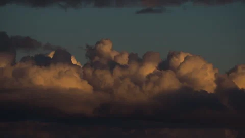4K 59.94fps Time-Lapse Epic Sunset Cumulus Clouds  Golden Hour Sky Motion (UHD) Stock Footage 322181361