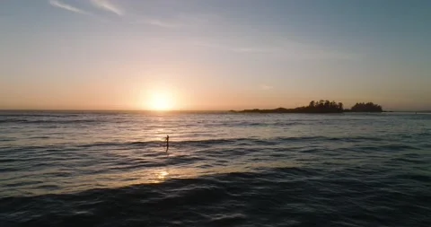 4K, 5k Aerial Paddle Boarding Ocean Sunset Stock Footage 170591285
