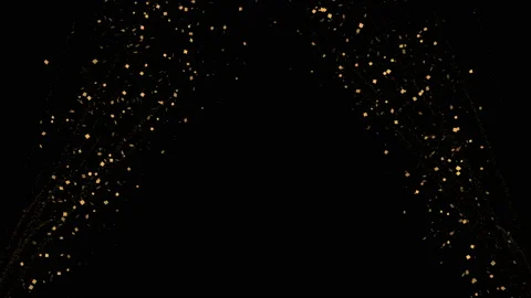 4k. 60 fps. Confetti explosion. Falling golden particles. Christmas lights Stock Footage 119347673