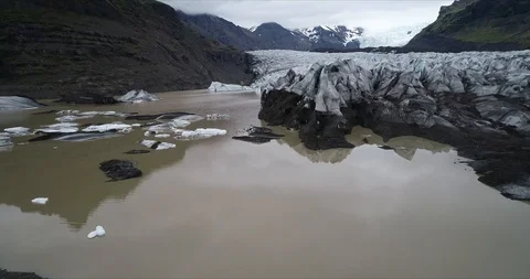 4k 60 fps Iceland Aerial view of Svínafellsjökull Glacier -from shore and top Stock Footage