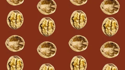 4K 60FPS Animated Loop Background -  Walnuts Flowing Vertically and Rotating Stock Footage 142109249