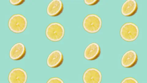 4K 60FPS Animated Loop Background -  Lemons Flowing Vertically and Flipping Stock Footage 142109305