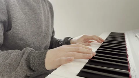 4K 60fps of childs hands playing piano Stock Footage 170044860