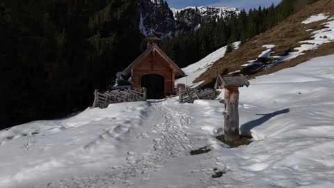 4K 60fps Cinematic Drone Ascend over Alpine Chapel in Talschluss Видео 331494635