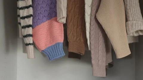 4k 60fps closeup video of clothes in a hanging locker Stock Footage 168732830