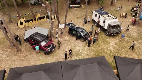 4K 60fps Drone Editorial: Flying Backward Reveal of Overland Festival, Duchonka Stock Footage 336361171