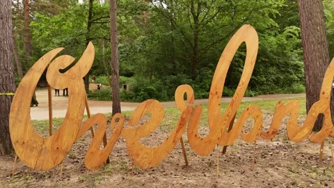 4K 60fps Drone Editorial: Overland Festival Sign and Camp at Duchonka Stock Footage 336360981