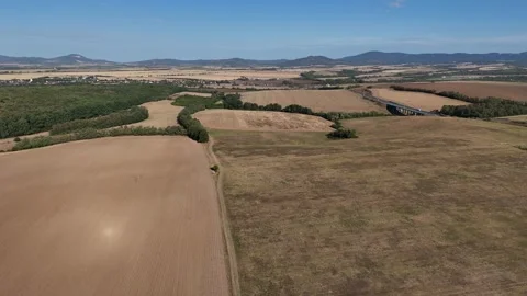 4K 60fps Drone Flyover: Countryside Mosaic &amp; Highway Viaduct Stockbeeldmateriaal 345046501
