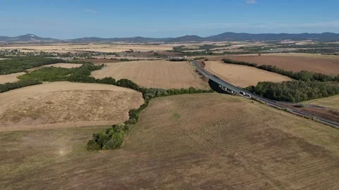 4K 60fps Drone Flyover: Highway Bridge, Fields &amp; Hills Stockbeeldmateriaal 344741976