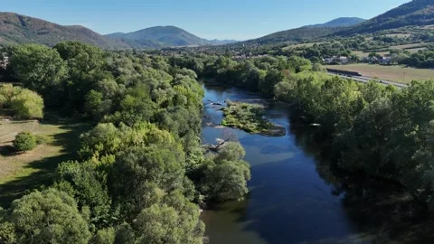 4K 60fps Drone Flyover: River Hron Valley and Mountains Stockbeeldmateriaal 344057535