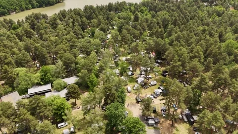 4K 60fps Drone : Forward Flight  Overland Festival Campsite, Duchonka Lake Stock Footage 336361801