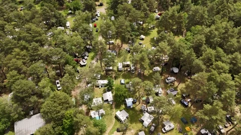 4K 60fps Drone High-Angle Forward Flight Overland Festival Campsite in Forest Stock Footage 336362675