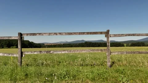4K 60fps Drone: Sideways Flight Along Wooden Fence and Horse Stock Footage 337540457