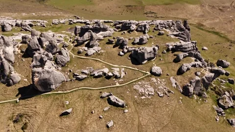 4K 60FPS FPV Drone Flight Through Castle Hill Rocks, New Zealand 스톡 동영상 332623927