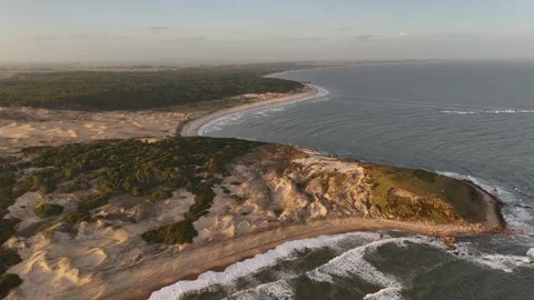 4K 60fps High Aerial Drone Video Epic Sunset Playa del Barco Beach Cerro Chato Stock Footage 332623933