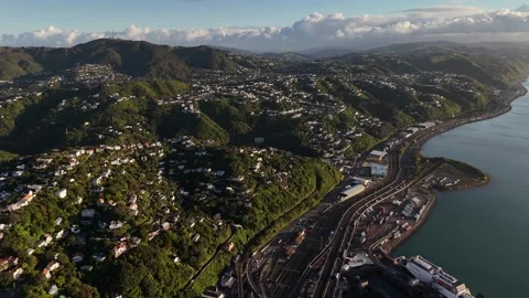 4K 60FPS High Aerial Reverse Flight Over Wellington Coast at Sunset Stock-Footage 340545910