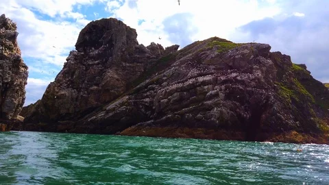 4k 60fps stabilized video from ocean level Cliff Ocean 스톡 동영상 112572339