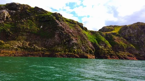 4k 60fps stabilized video from ocean level Cliff Ocean 스톡 동영상 112572342