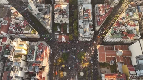 4K 60FPS Top-Down Drone View: Buenos Aires University Protest at Sunset Stock Footage 335922082