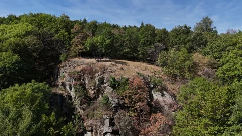 4K 60fps Vertical Drone Pedestal Ascend: Sedlova Skala Cliff Edge Stock Footage 345724835