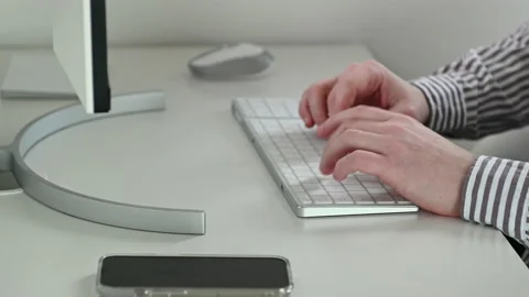 4K 60fps video of hands typing on keyboard befor computer working at office Stock Footage 168438305
